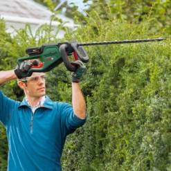 Bosch Power For All 18V 550mm UniversalHedgeCut 18-55 Cordless Hedge Trimmer -Flyymo Care Garden Shop bosch power for all 18v 550mm universalhedgecut 18 55 cordless hedge trimmer4059952558776 06i bq